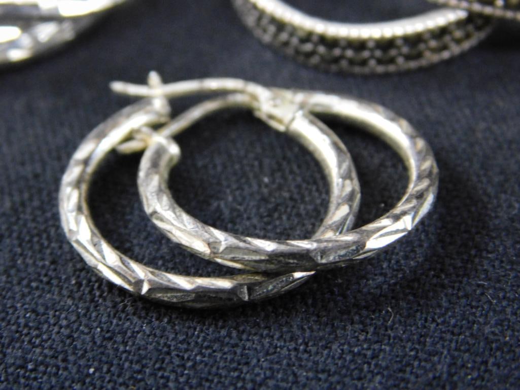 Sterling Silver - 9 Pairs of Pierced Hoop Earrings - 24.83 Grams TW - 11