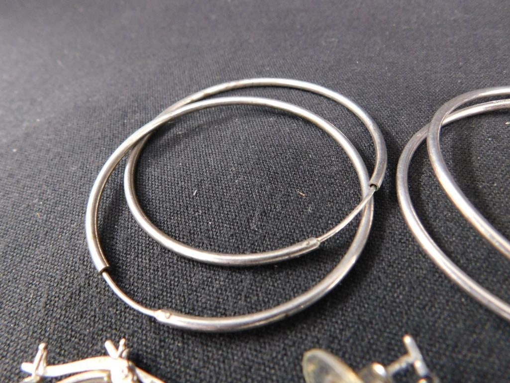 Sterling Silver - 9 Pairs of Pierced Hoop Earrings - 24.83 Grams TW - 3