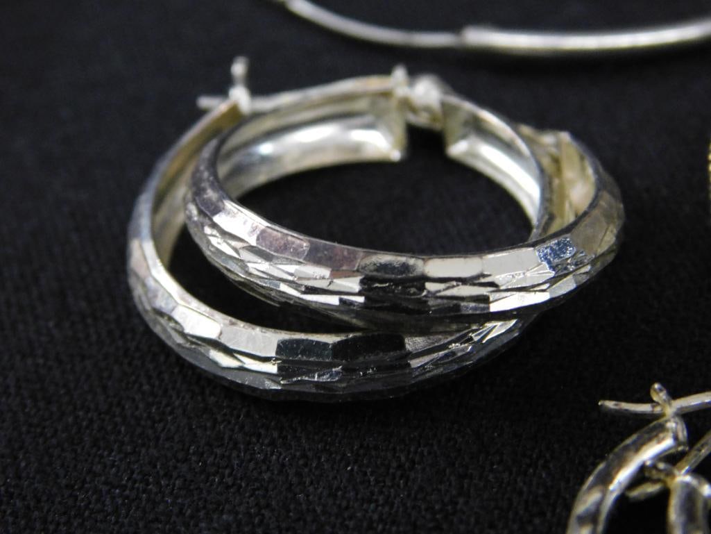Sterling Silver - 9 Pairs of Pierced Hoop Earrings - 24.83 Grams TW - 7