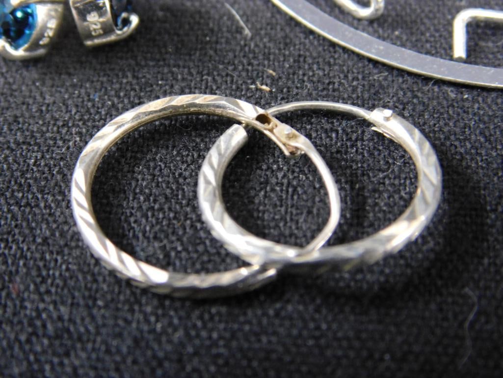 Sterling Silver - 7 Pairs of Pierced Hoop Earrings - 25.72 Grams TW - 6
