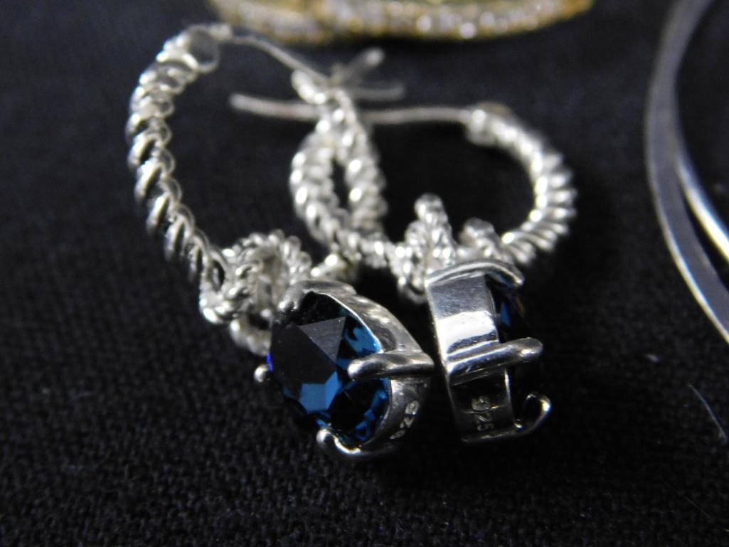 Sterling Silver - 7 Pairs of Pierced Hoop Earrings - 25.72 Grams TW - 7