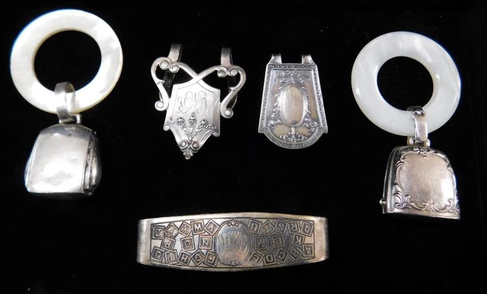 Sterling Silver - 2 Book Markers and Napkin Ring 36 Grams - 2 Webster Rattles 31 Grams TW: See Photos For Condition and Details 