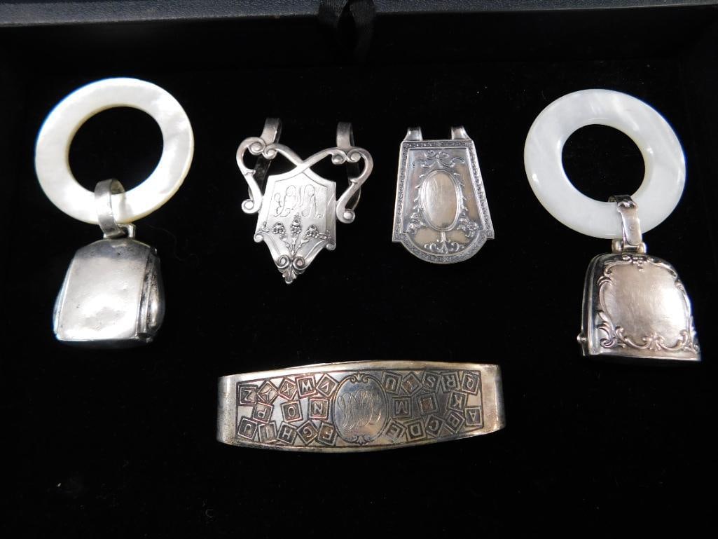 Sterling Silver - 2 Book Markers and Napkin Ring 36 Grams - 2 Webster Rattles 31 Grams TW - 9