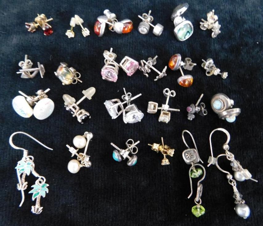 Sterling Silver - 24 Pairs of Earrings - 30.14 Grams TW: See Photos For Details and Condition