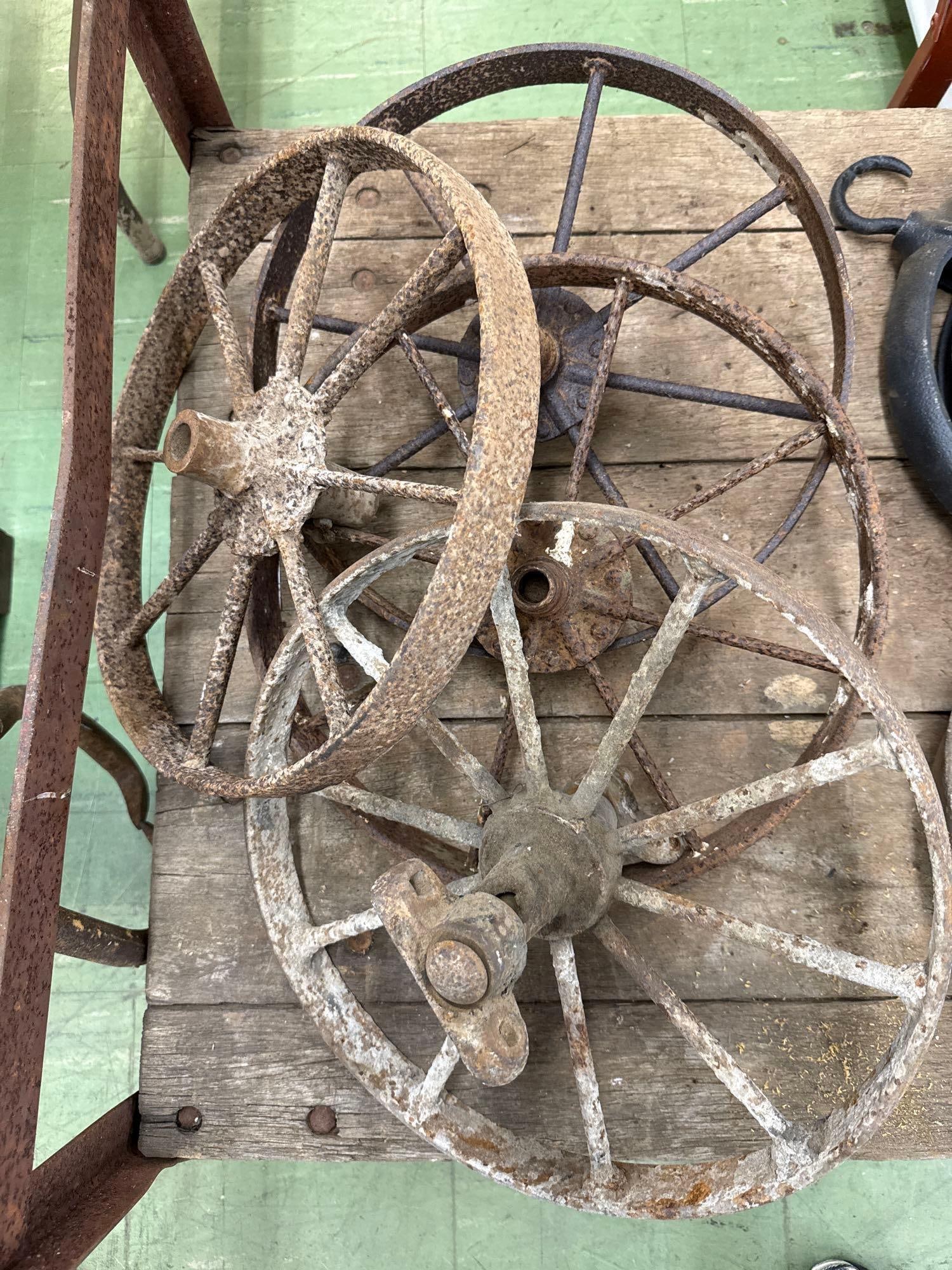 lot of four vintage metal wagon wheels: 10 spokes each, 15 across