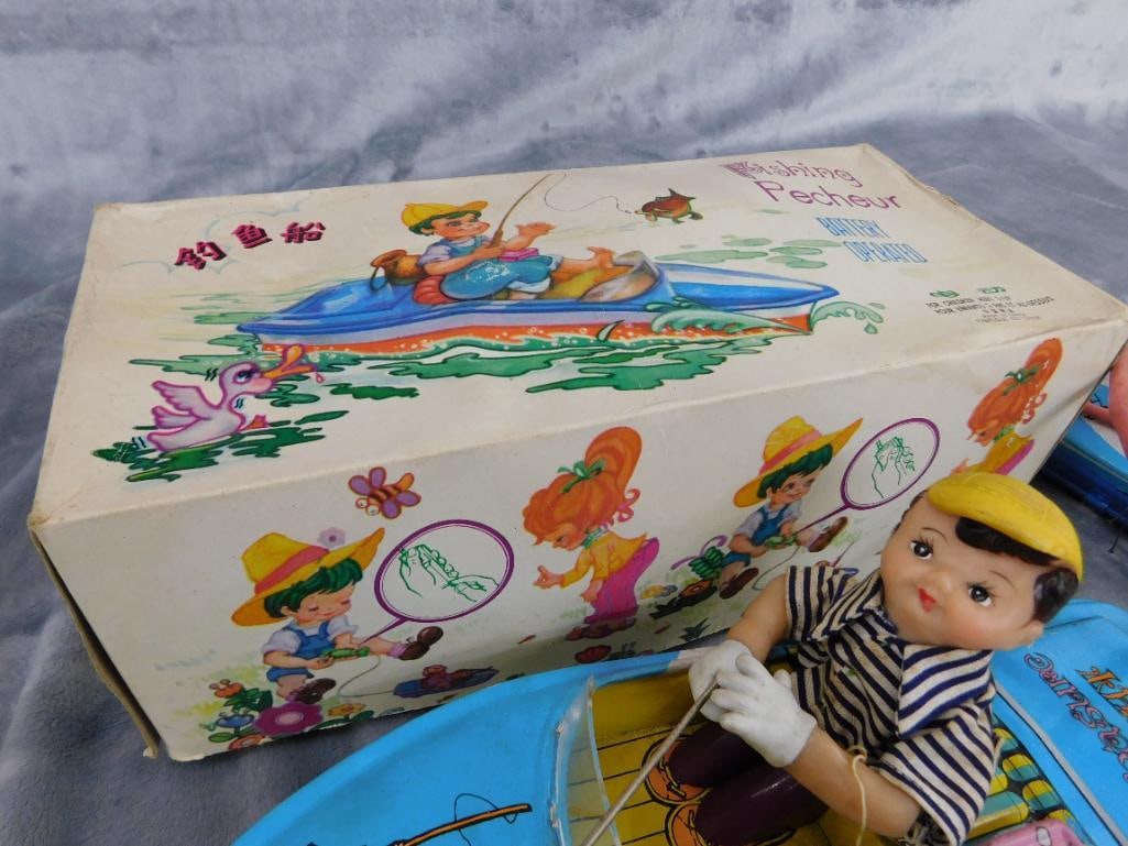 Vintage Chinese Litho Tin Battery Operated Fishing Boat Boy - 4" x 12" x 4.5" - 7
