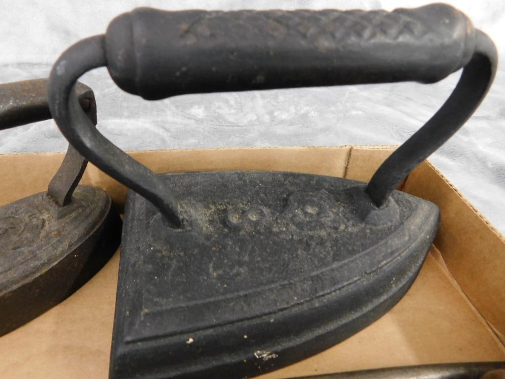 2 Sad Irons - 2 sets of Shoe Stretchers - 1 Sharpening Steel - 2