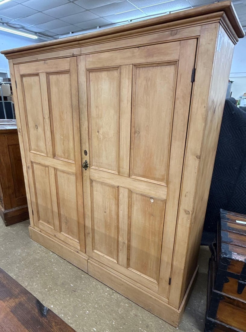 large wooden double door armoire: 67" x 63" x 17"