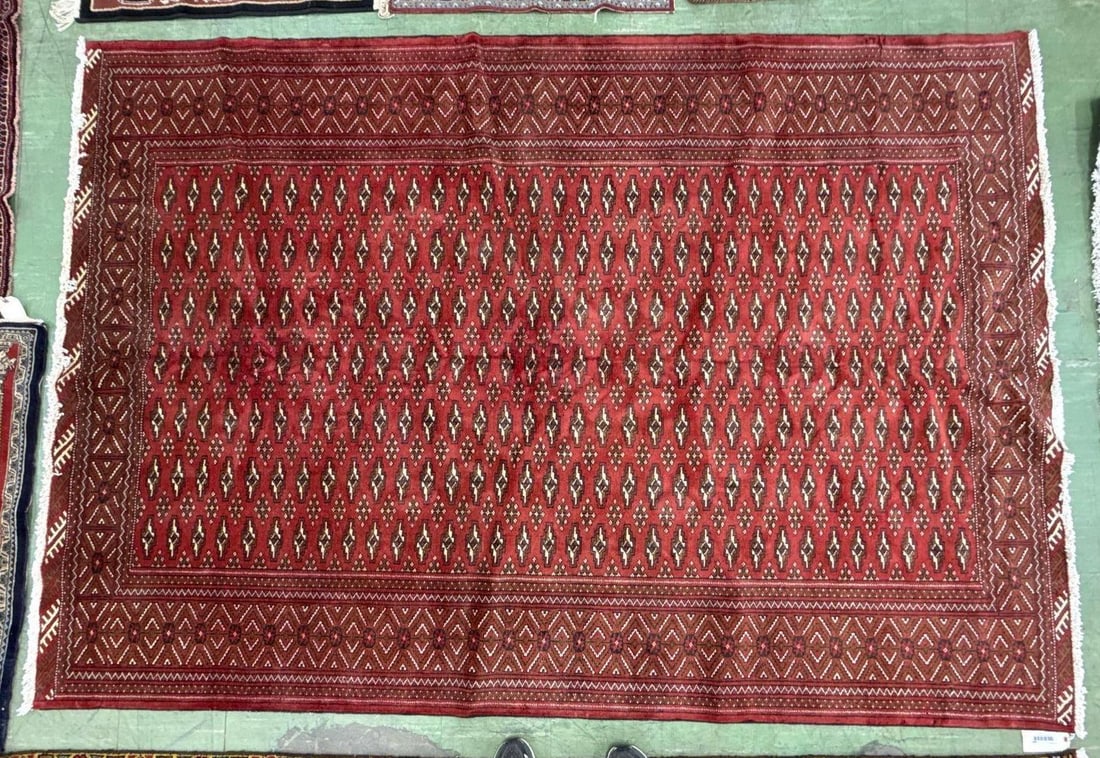 room size Bokhara rug 9'9" x 6'7": Turkoman, Iran, wool on cotton. 9'9" x 6'7".