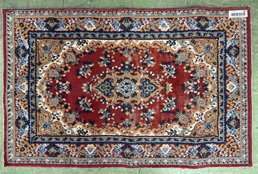 small area rug 2'11" x 1'10": 2'11" by 1'10". Wool.