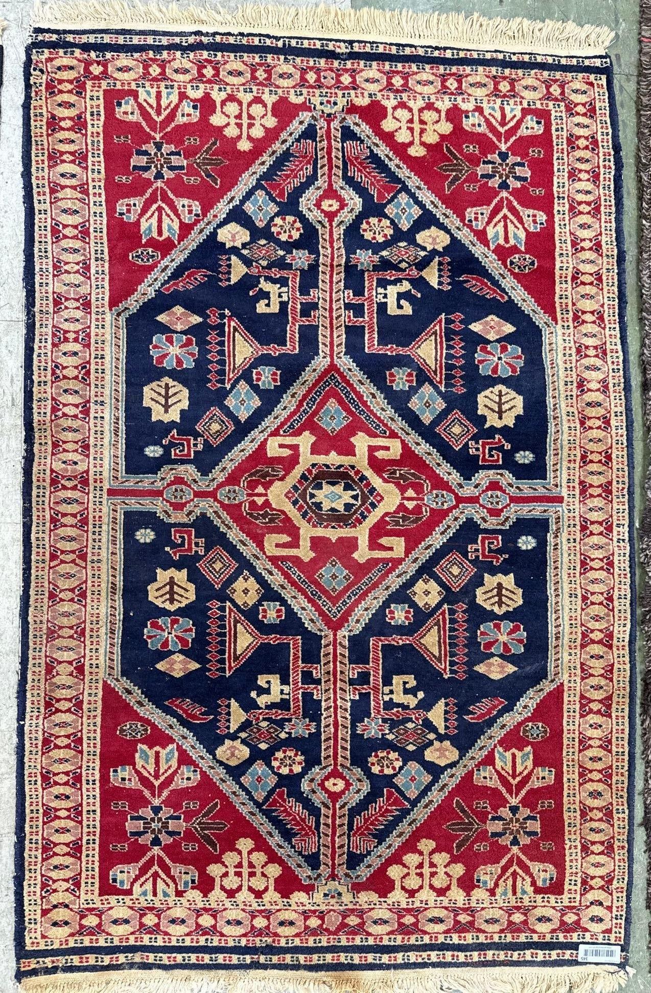 Area rug - 3'1" X 5': Wool, made in Pakistan.