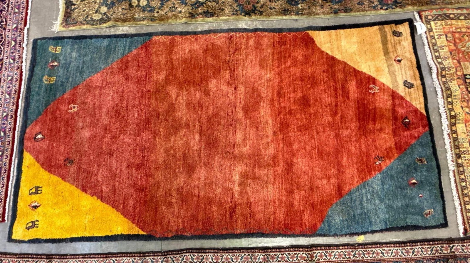 Area rug - 5'4" x 10'2": Wool made in Iran. GABBEH