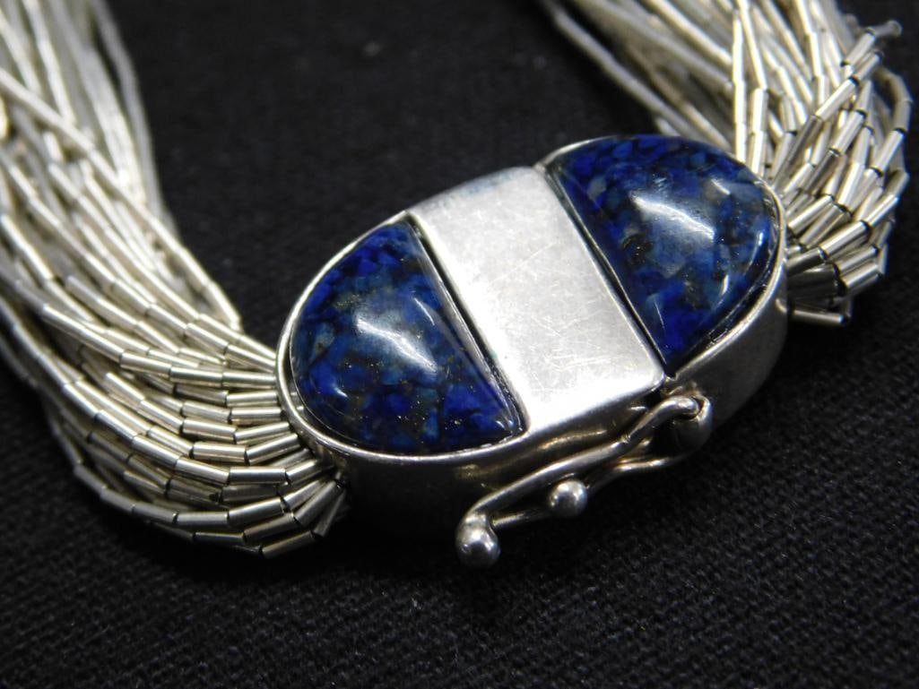 Sterling Silver - 7.5" Liquid Silver Bracelet with fancy Clasp - 27.25 Grams TW - 2