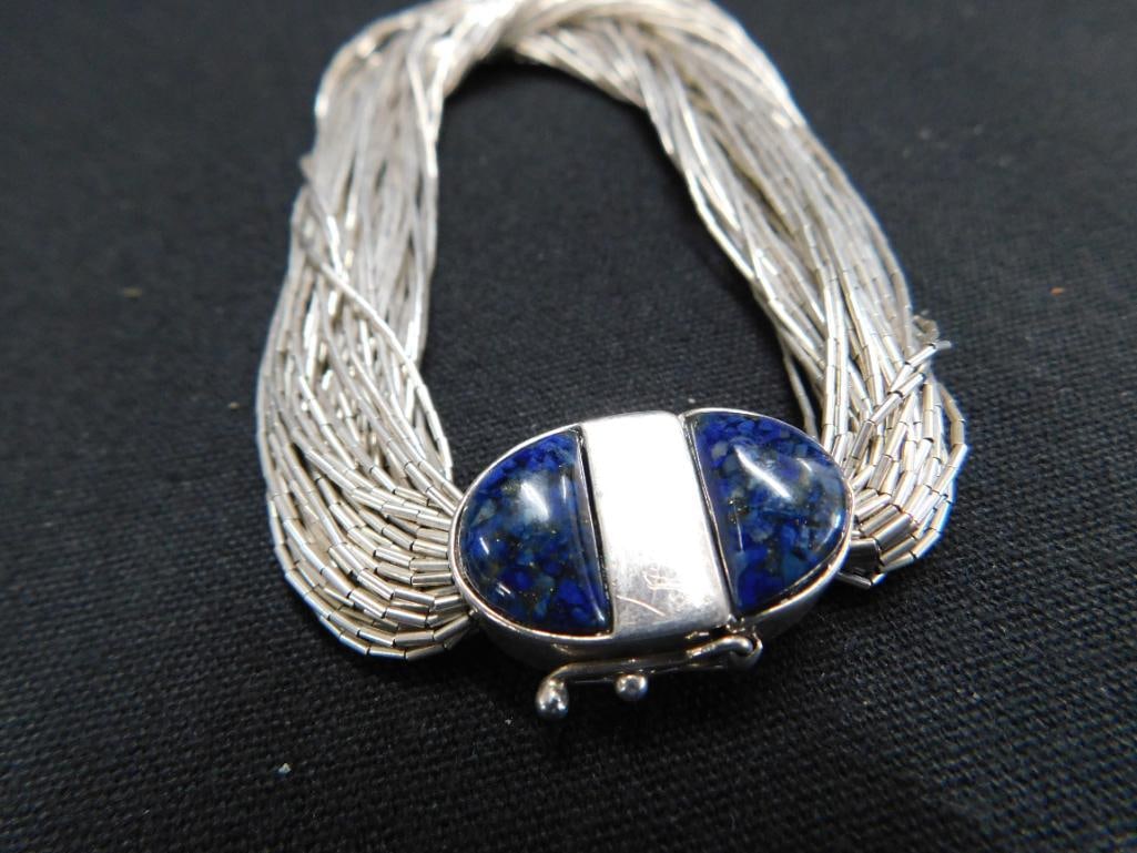 Sterling Silver - 7.5" Liquid Silver Bracelet with fancy Clasp - 27.25 Grams TW - 7