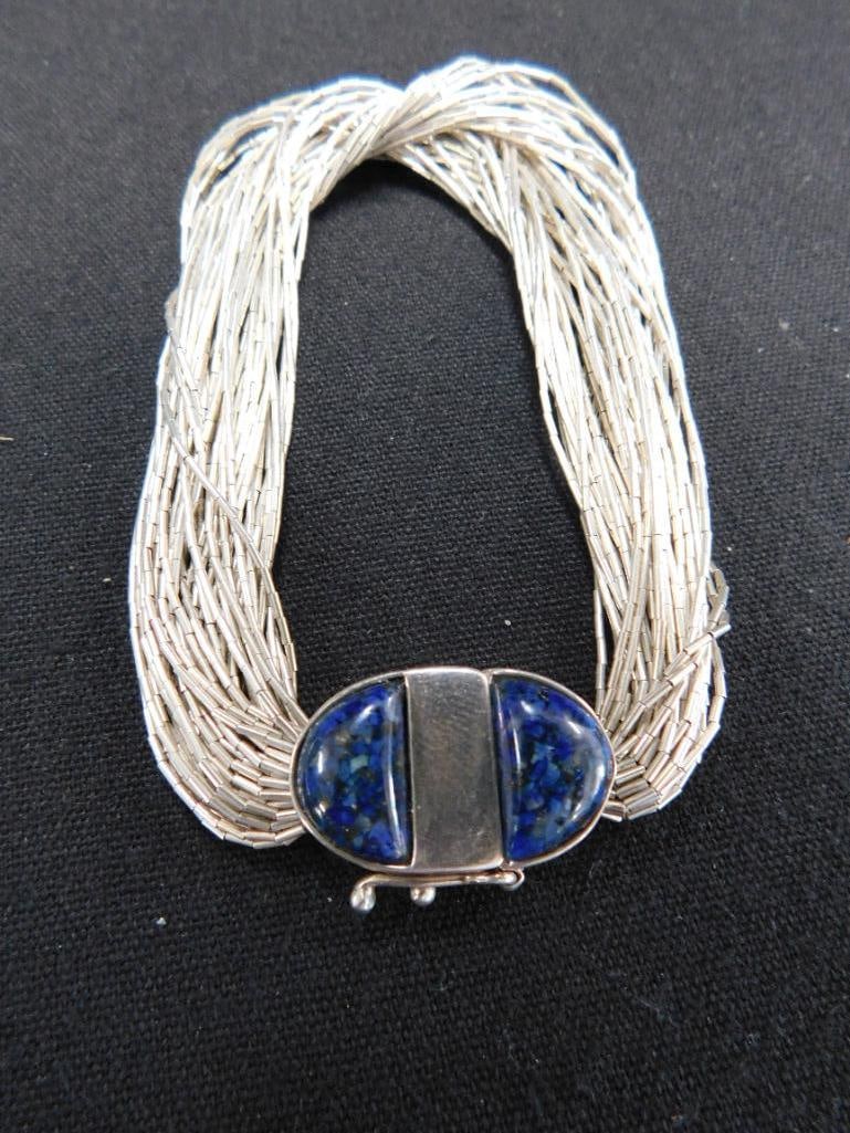 Sterling Silver - 7.5" Liquid Silver Bracelet with fancy Clasp - 27.25 Grams TW - 9