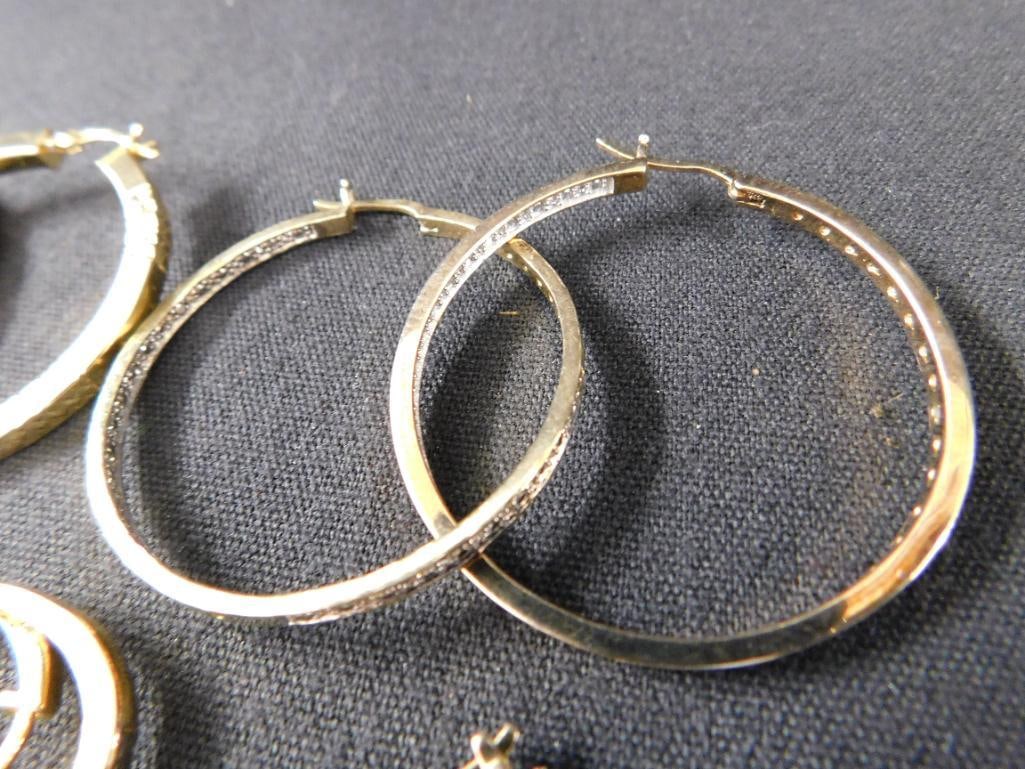 Sterling Silver - 7 Pairs of Hoop Earrings - 28.77 Grams TW - 3