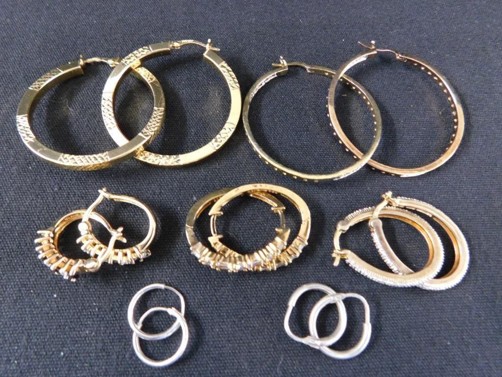 Sterling Silver - 7 Pairs of Hoop Earrings - 28.77 Grams TW - 9