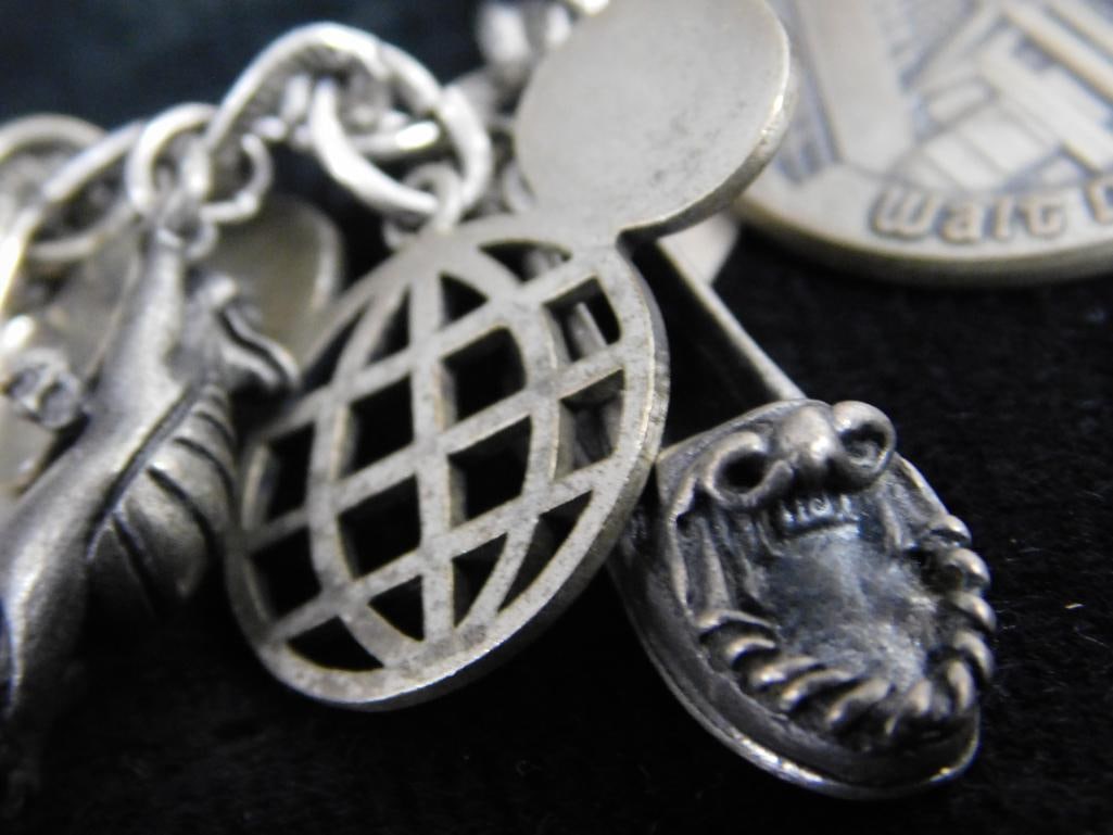 Sterling Silver - Charm Bracelet - 67.99 Grams TW - 10