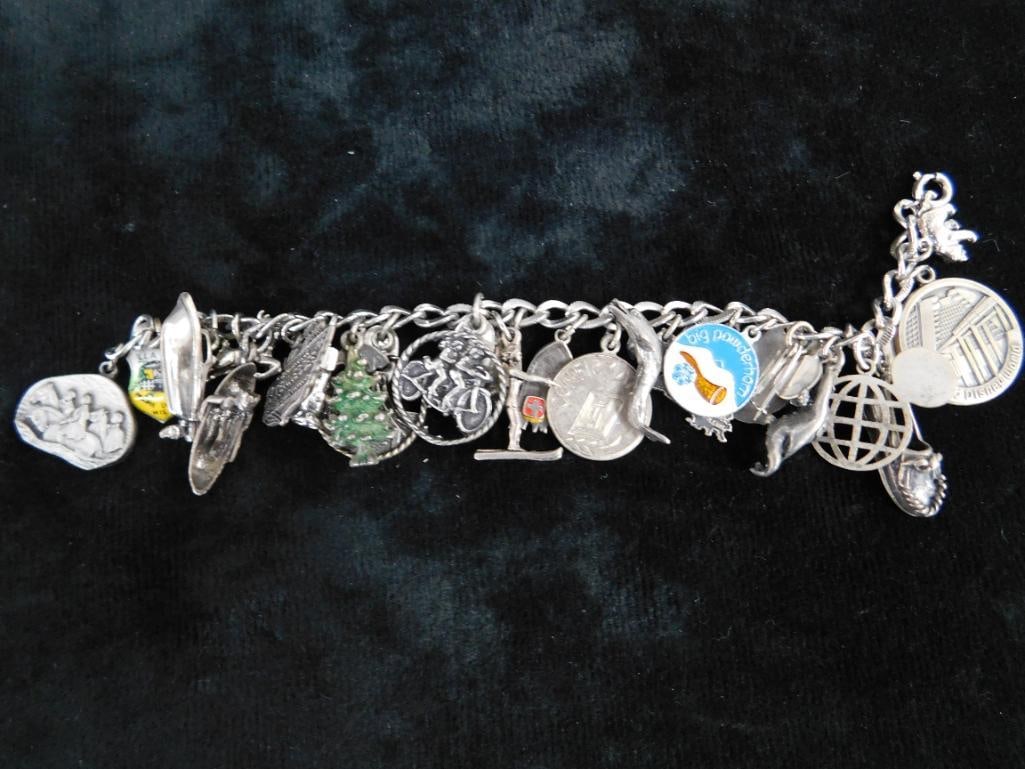 Sterling Silver - Charm Bracelet - 67.99 Grams TW - 13