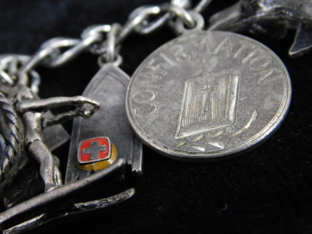 Sterling Silver - Charm Bracelet - 67.99 Grams TW - 7