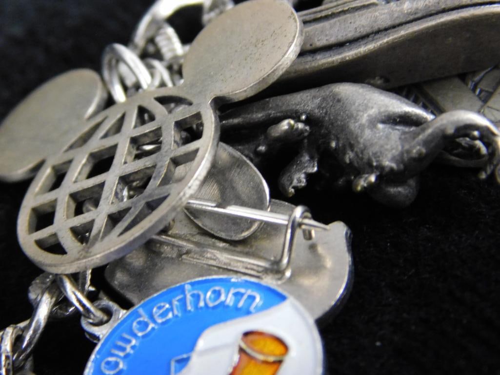 Sterling Silver - Charm Bracelet - 67.99 Grams TW - 9