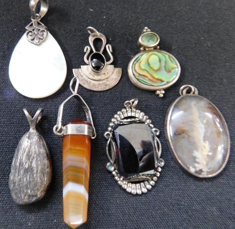 Sterling Silver - 7 Pendants - 36.94 Grams TW: See Photos For Description and Condition