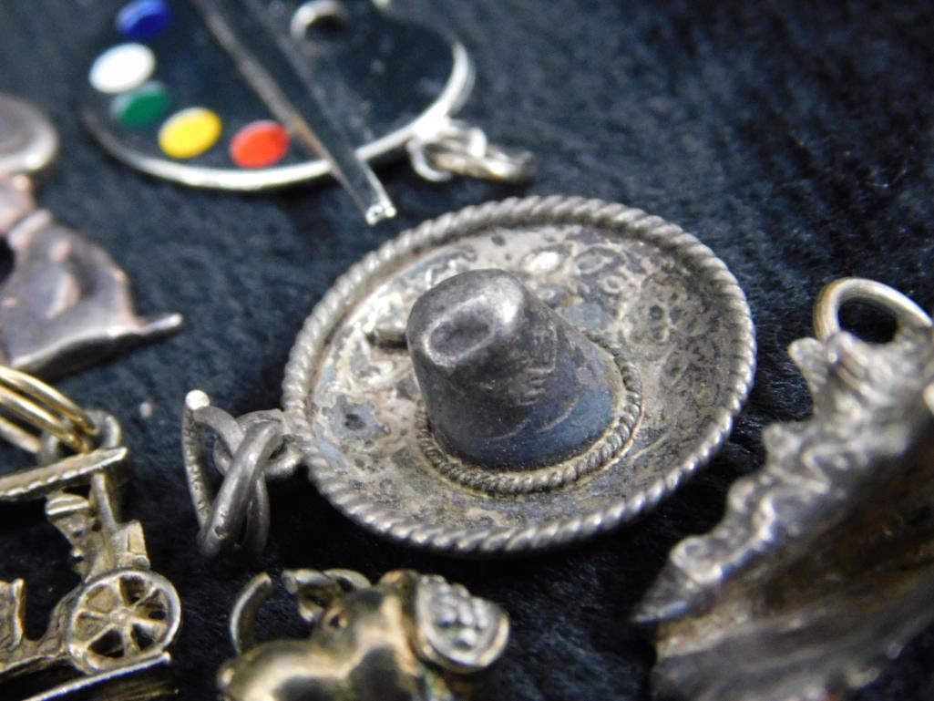 Sterling Silver - 12 Charms - 34.03 Grams TW - 7