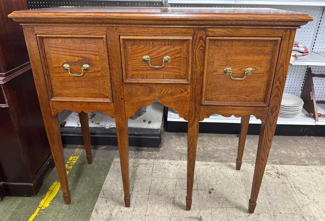 pine Hunt board: Ethan Allen pine huntboard features distinctive tapered Hepplewhite-style legs and brass hardware. 311 wide by 17 deep by 37 tall.