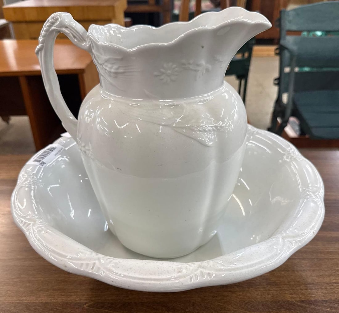 Married pitcher and basin set: Pitcher is Johnson Brothers Ironstone, 11 inches tall. The bowl is J&K Meakin, Nanley England. Both are ceramic. 16 inches across by 5 1/2 inches tall.
