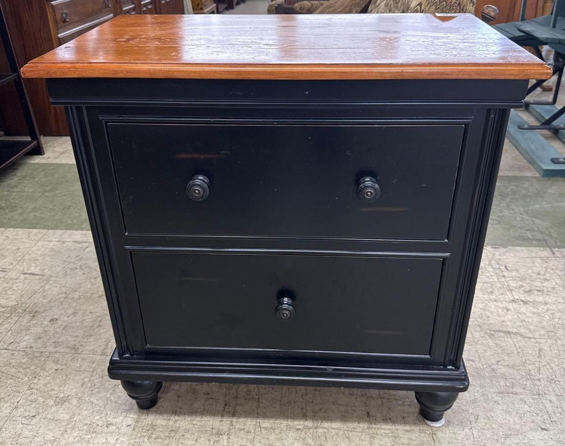 two drawer nightstand: Natural top with black painted base. Newer. 30 wide x 17 Deep x 30 tall.
