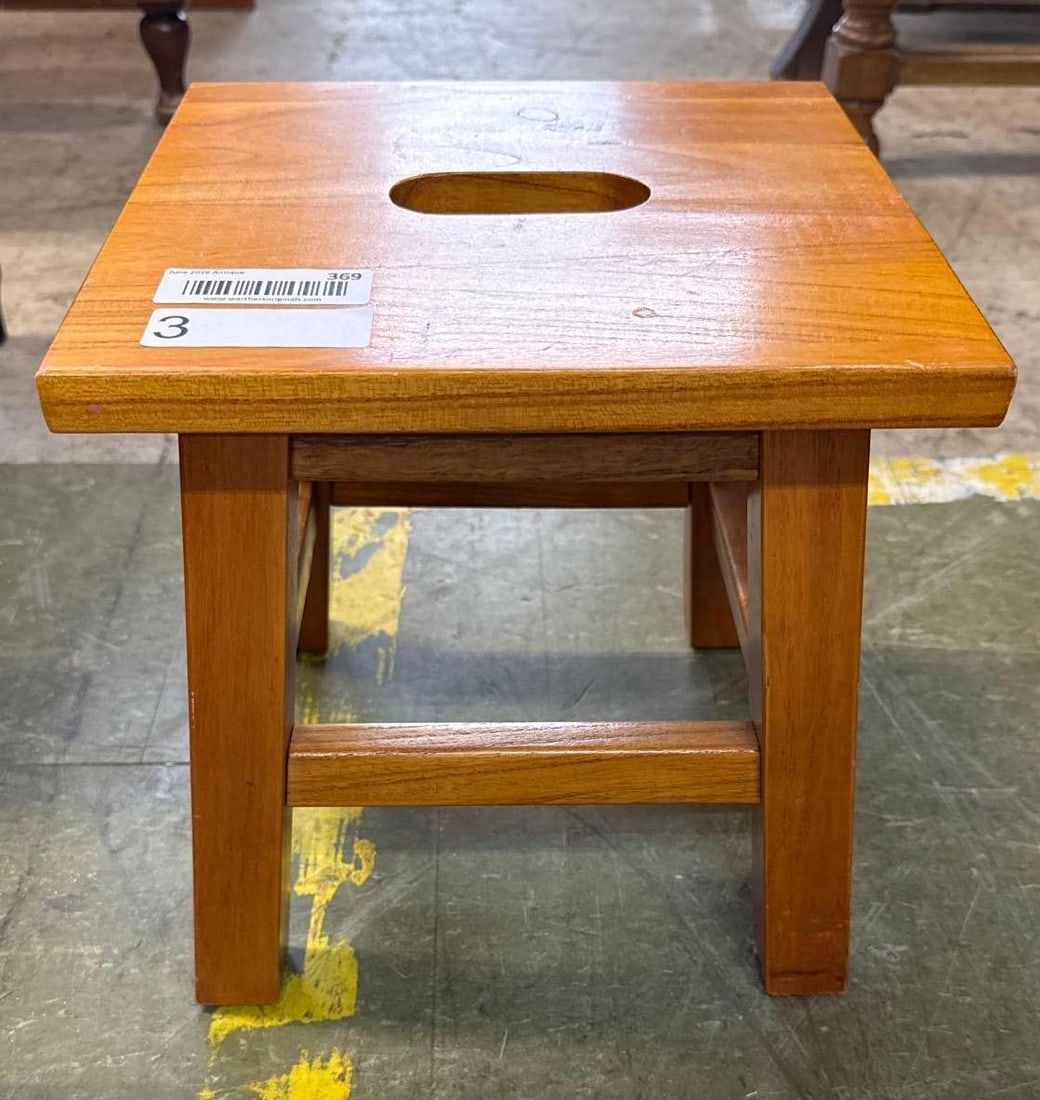 Square wooden stool: Cut out handle in the seat. 11 inches wide by 12 inches tall.