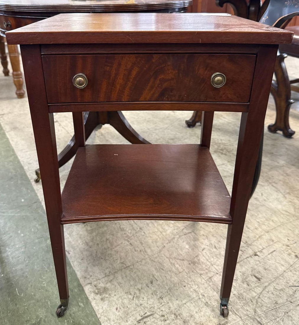 Cherry side table: One drawer, Curved front drawer. 17 1/2 inches wide by 16 inches deep by 26 1/2 inches tall.