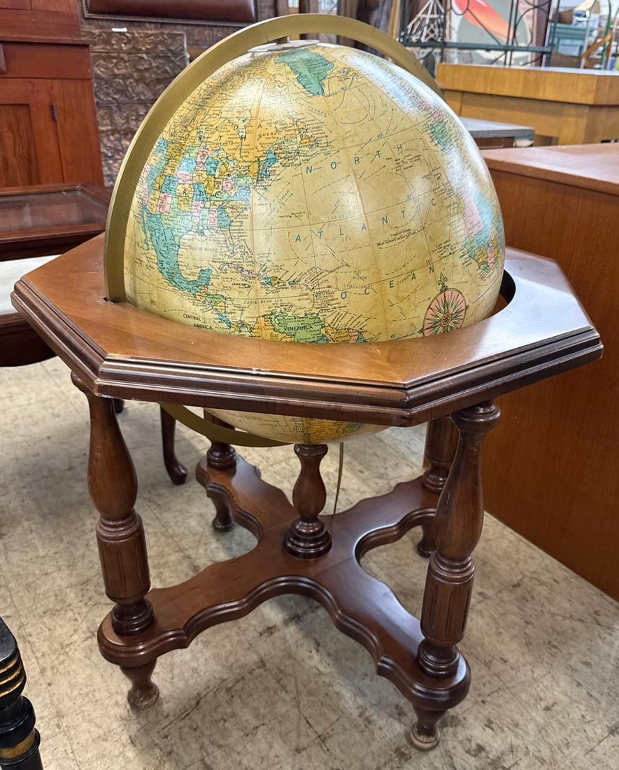 illuminated electric globe: 28 inches wide by 37 inches tall.