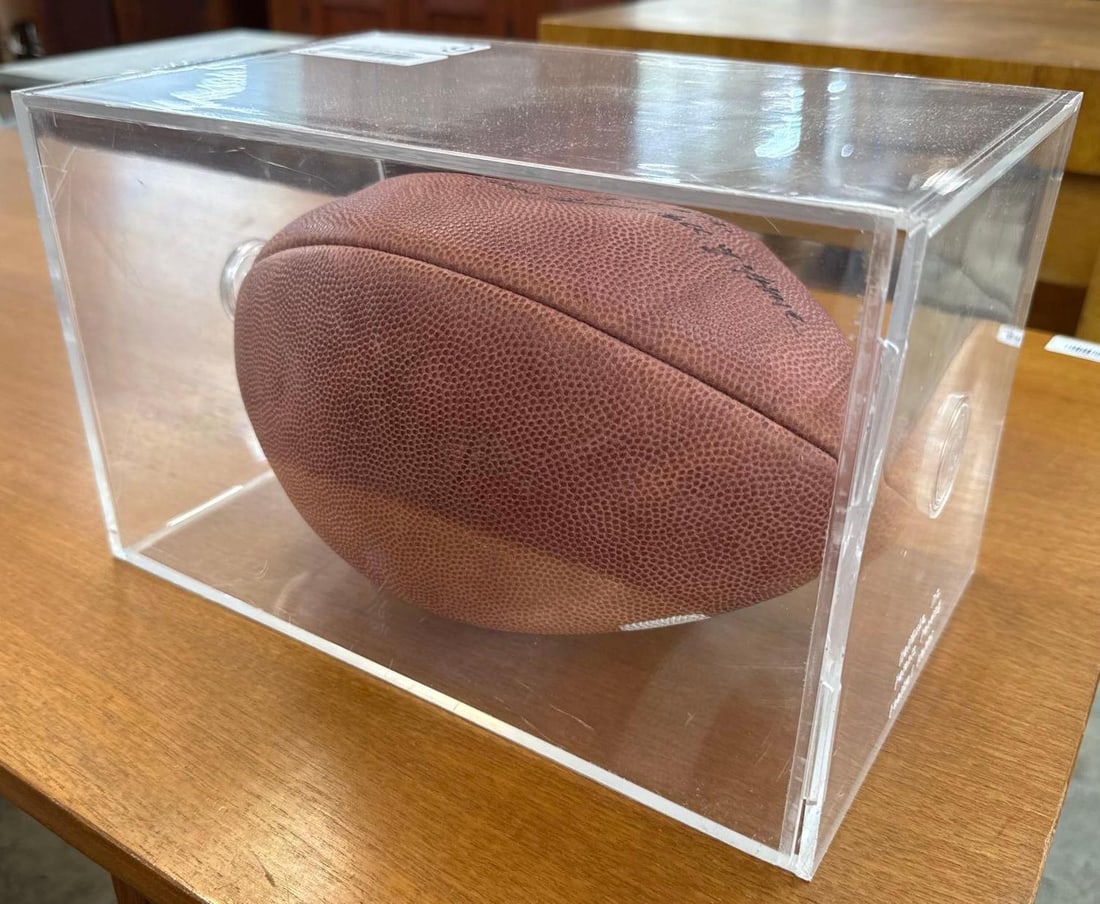 vintage signed Jake Gibbs football: In Lucite display box. Display box measures 12 x 7. Signed by Jake Gibbs Mississippi quarterback number 12 college football Hall of Fame 1995.