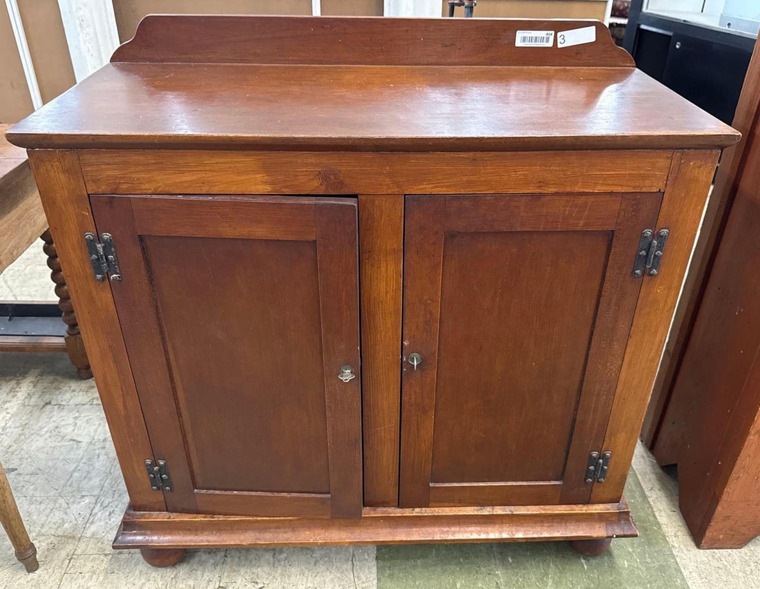 two door Cherry country cabinet: 37 inches wide by 16 1/2 inches deep by 38 inches tall