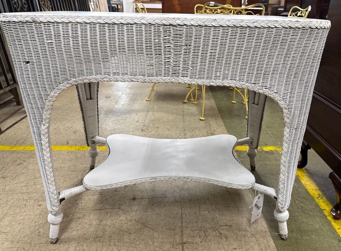 White wicker table: Has a bottom shelf 31 inches tall 36 1/2 inches wide 25 inches deep