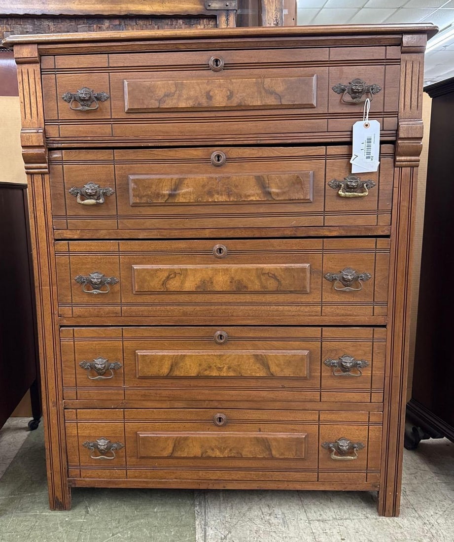 five drawer veneer chest of drawers: 49 1/2 inches tall 40 inches wide 18 1/2 inches deep