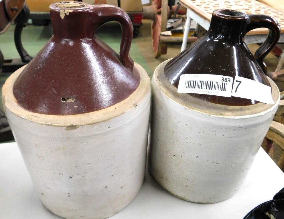 pair of antique stoneware jugs: 1 gallon each 11 x 7 one has a glossier glaze on the other