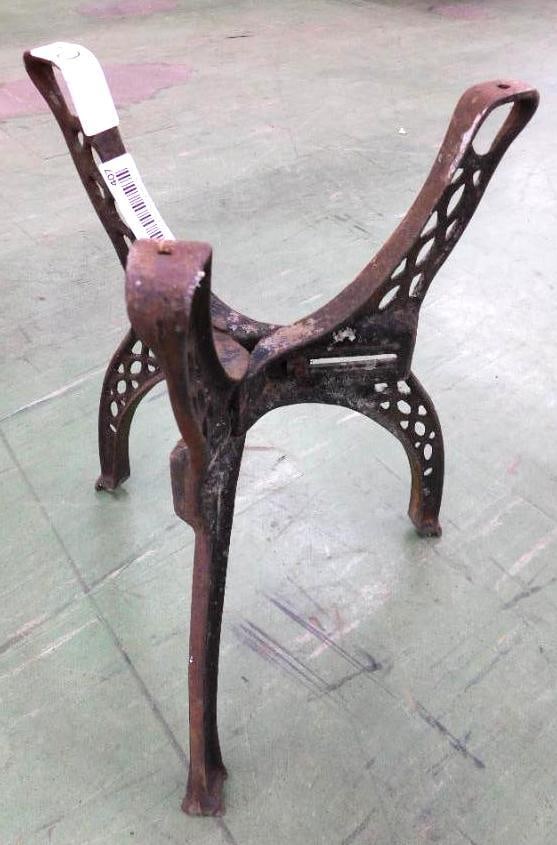 antique cast-iron base: Possibly for a water heater or tank. 16 x 12