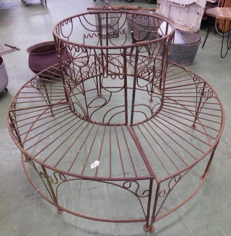 wrought-iron Circular tree bench: 34 inches by 52 inches round. The opening for the tree is 23 inches round.