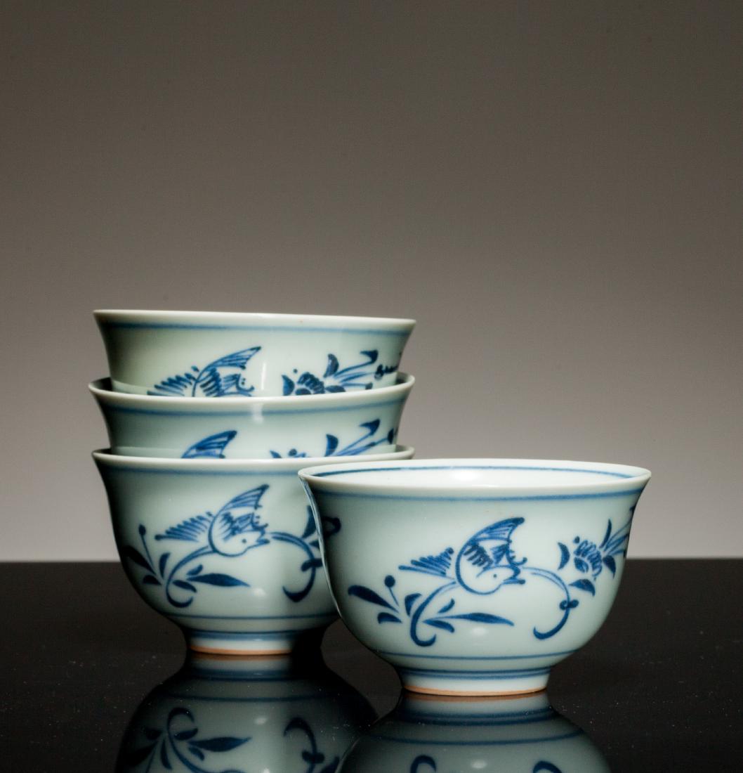 Group Late Ming Antique Blue&White Tea Cup: Well potted with deep rounded sides rising from a short foot to an everted rim, the exterior bordered with floral blooms and birds, the rim and foot with double-rings. 3 inch Diameter; 1.7 inch H
