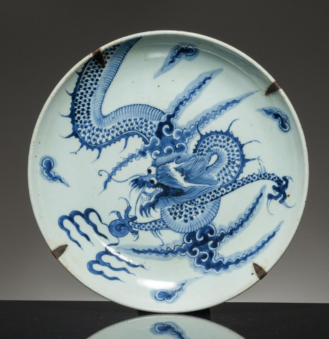 18th Chinese Antique Blue&White Dish: With gently rounded sides rising from a slightly tapered foot, boldly painted with five-clawed dragon leaping amidst clouds, the exterior with one further dragon striding in pursuit of "flaming pearls