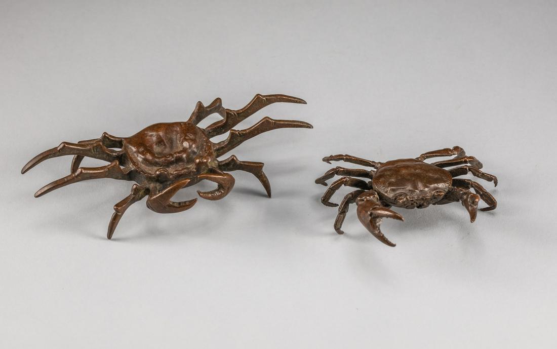 Group 19th Meiji Period Japanese Bronze Crabs: Each with a broad rounded carapace with naturalistic bumps and a ridged edge, two conical eyes emerging from the front of the shell, the eight spindly legs extending to the sides, the powerful forecla