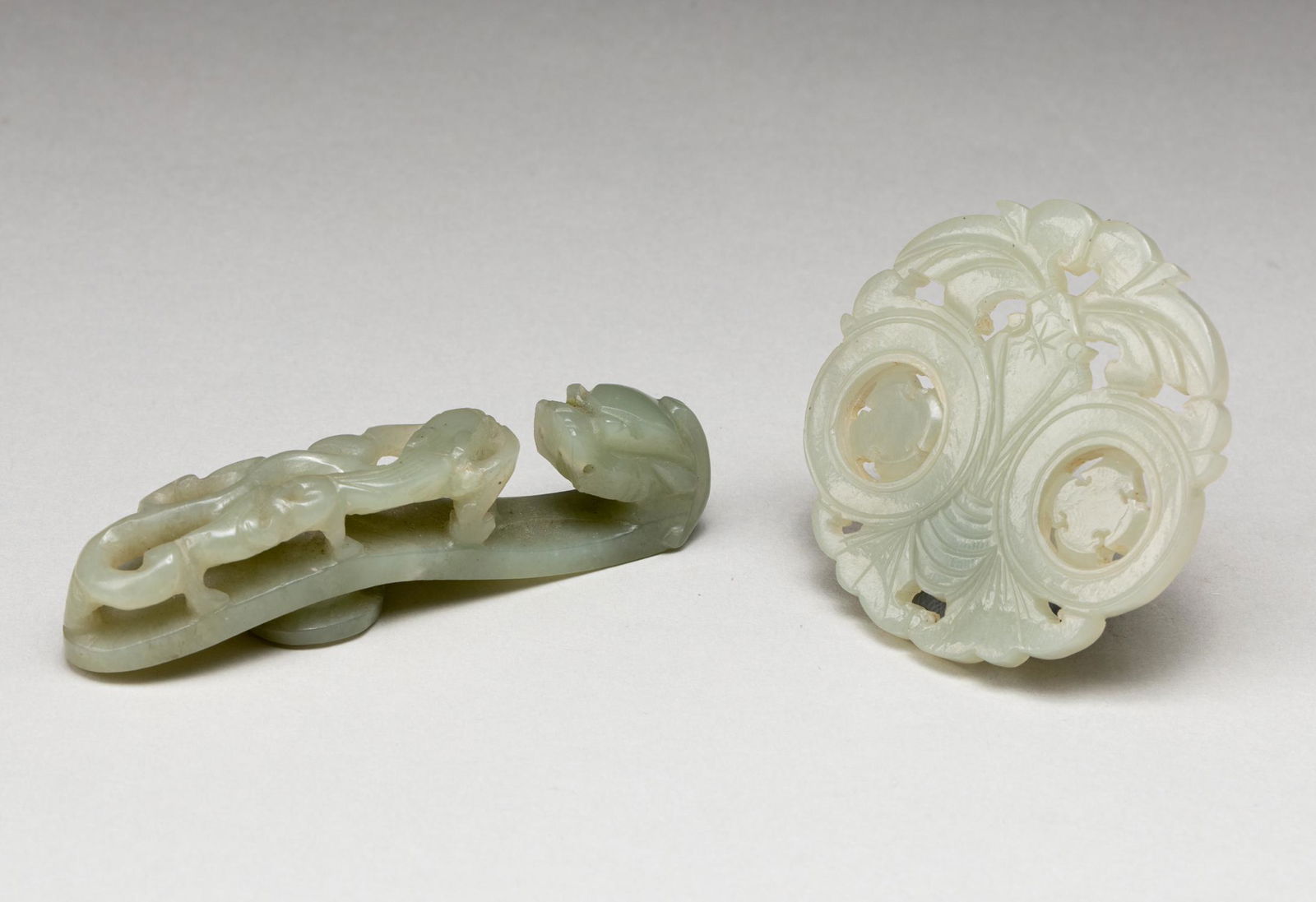 Set Of 19th Chinese Antique Jade Pendant: The set includes one jade belt hook, and one jade pendant, the belt hook shaft finely carved with a chilong crawling towards the dragon headed hook, the underside with an oval knob attachment, one ope