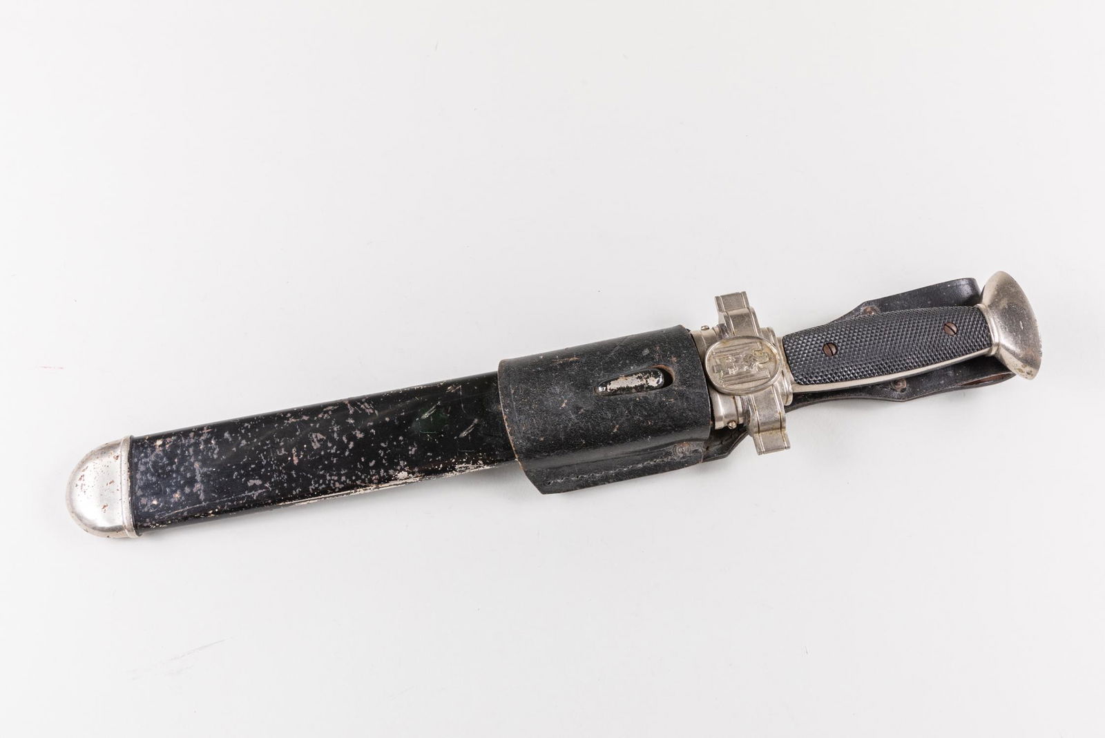 World War II German Antique Dagger Nazi: Nazi Red Cross 1938 pattern, subordinateÃ¢€â„¢s dagger with nickel hilt with plastic grips and sawback blade, with leather frog, stamped- Alfred Paetzold Berlin. Approximately 16.25 inch L