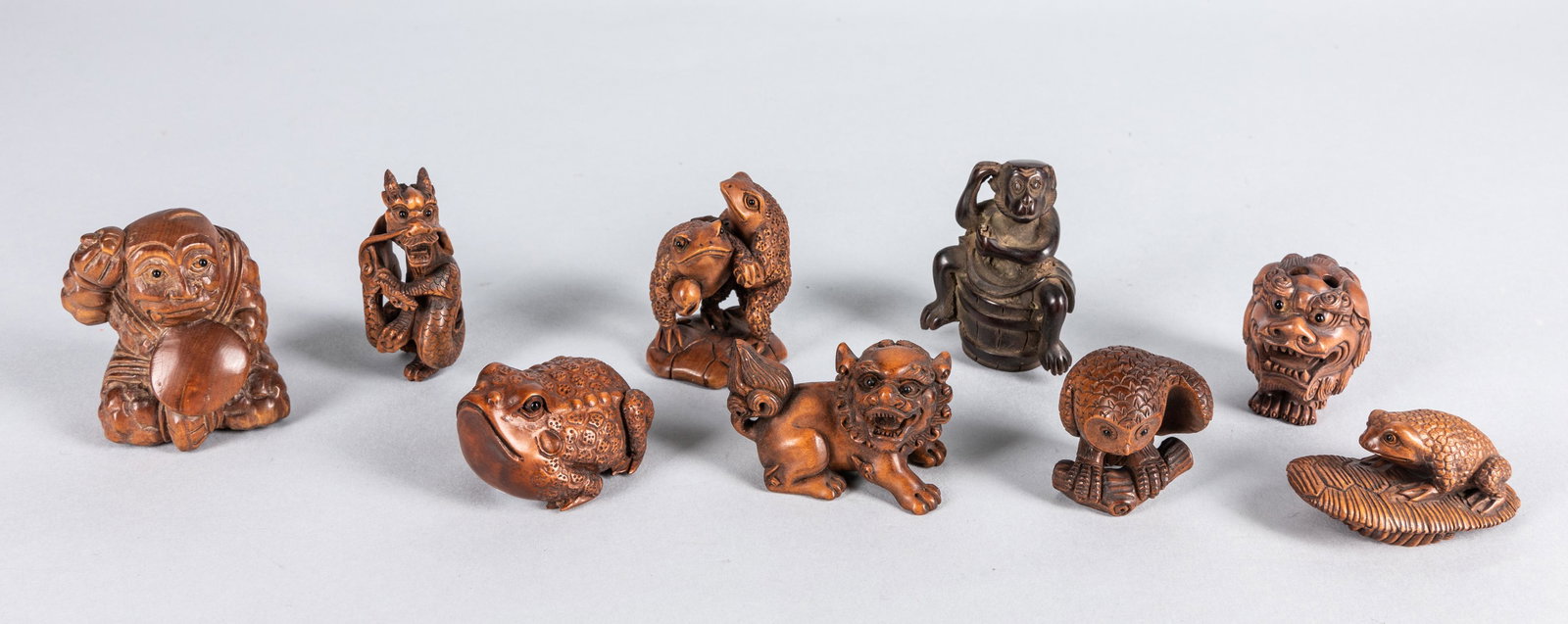 Set of Vintage Japanese Boxwood Netsukes: Set of 9 pieces, carved in different shape including frog, foo dog, dragon, owl etc, with sign, 2.1*1.2 inch