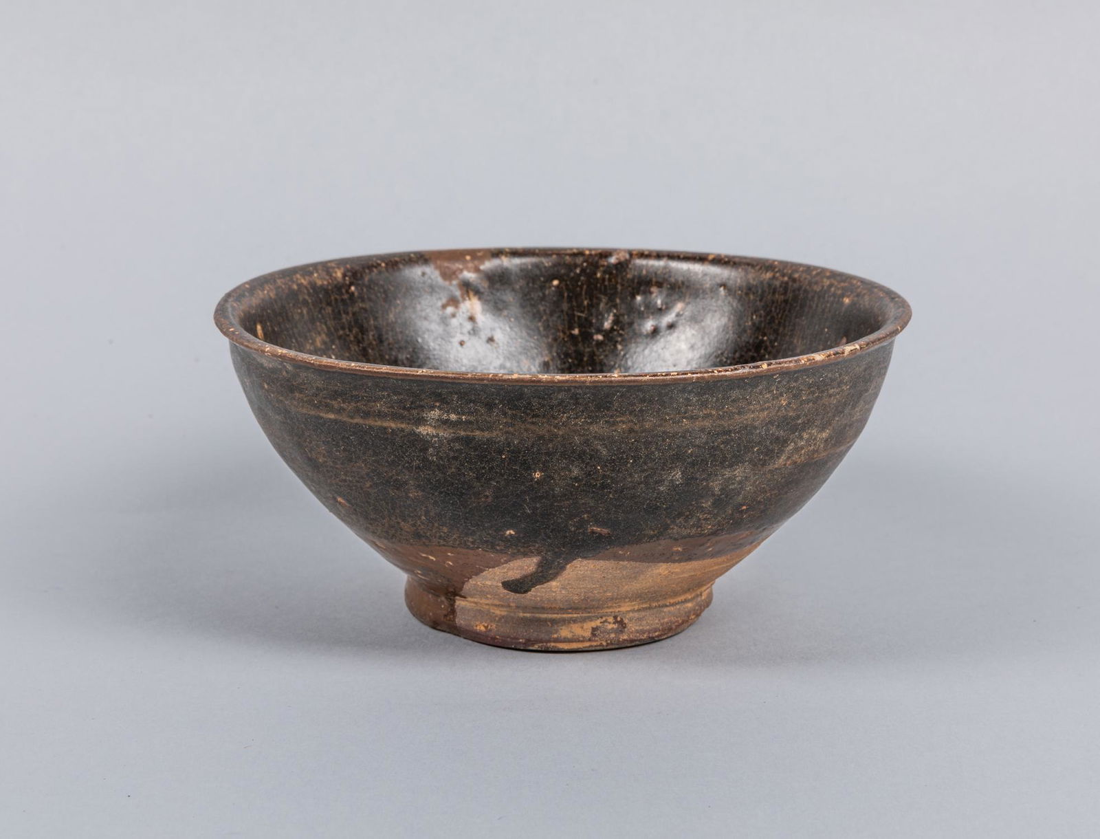 18-19th Korean Antique Porcelain Tea Cup Bowl: The deep rounded sides resting on a straight foot, applied overall in brownish tone save for the foot. The estate of Cota Maeda, Tokyo, 1989. 6.1*2.7 inch
