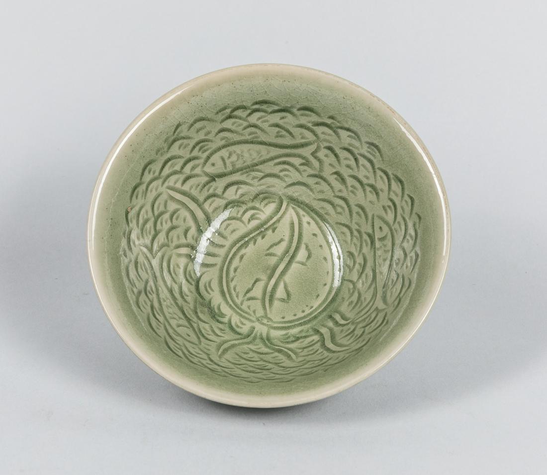 Korean Old Celadon Glazed Tea Cup,1900-1960: 1900-1950 period Korean carved celadon glazed tea cup. Size: 4.75 inch D. 2 inch H.