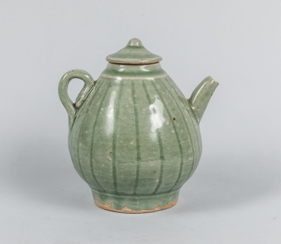 Korean Joseon Dynasty Style Celadon Glazed Porcelain: Korean Joseon dynasty carved celadon glazed porcelain tea pot, the estate of King Kun Won, 1985. Size: 5.25 inch H.