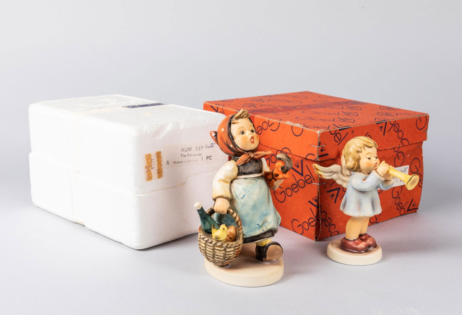Set of W Germany Goebel Porcelain Figure: Set of two porcelain figure with original box, W Germany, Goebel. Size: 4.75 inch H (largest)